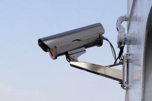 an image of a silver cctv camera